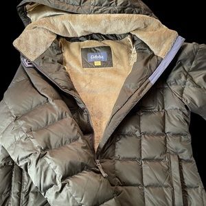 Women’s navy green Cabellas coat.